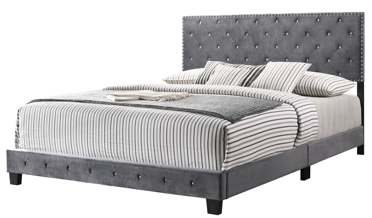 Transitional gray king bed with tufted upholstered headboard and nailhead trim, striped bedding