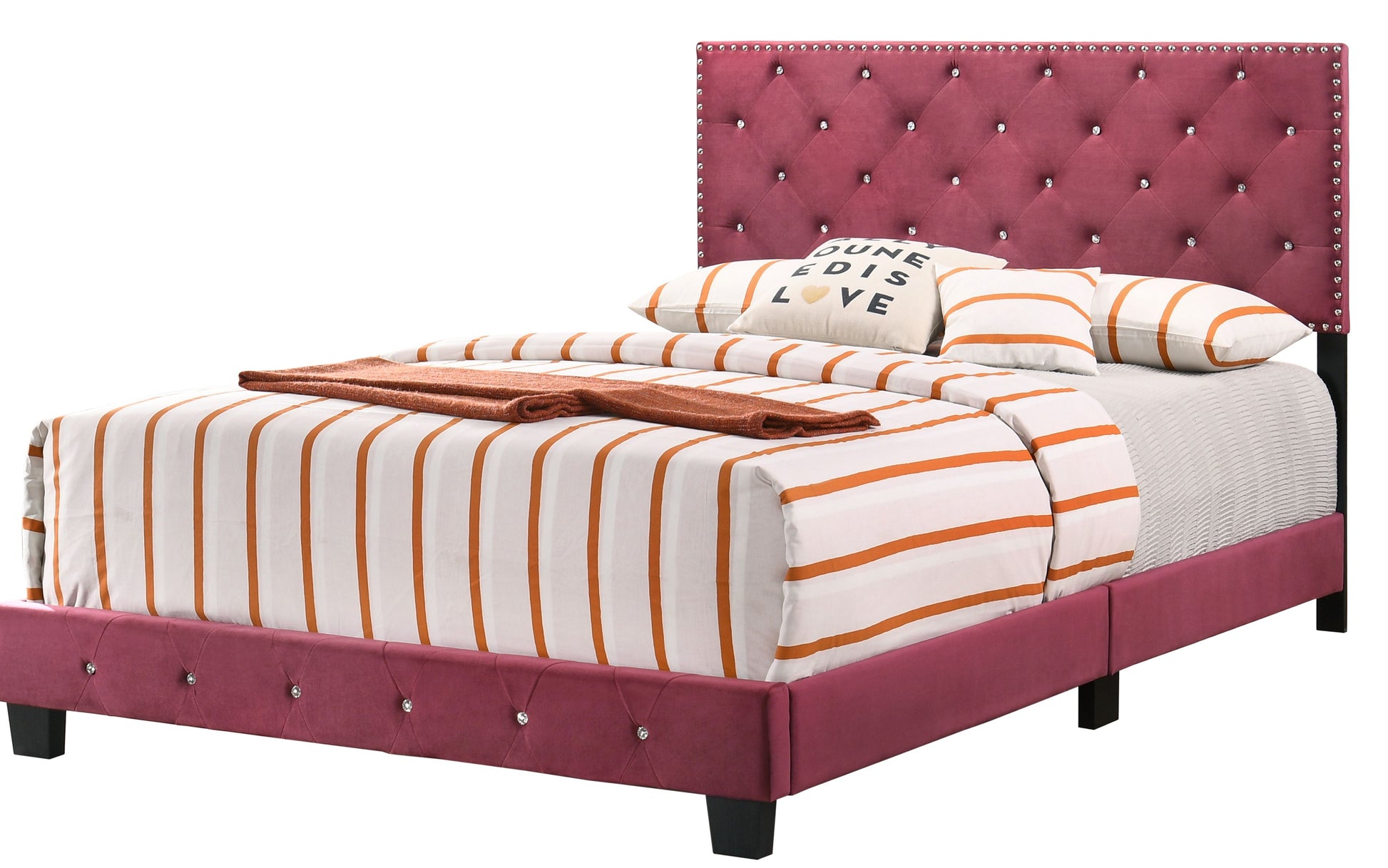 Charming Cherry full bed with pink tufted velvet headboard, crystal studs, and orange-striped bedding