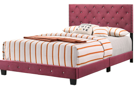Charming Cherry full bed with pink tufted velvet headboard, crystal studs, and orange-striped bedding