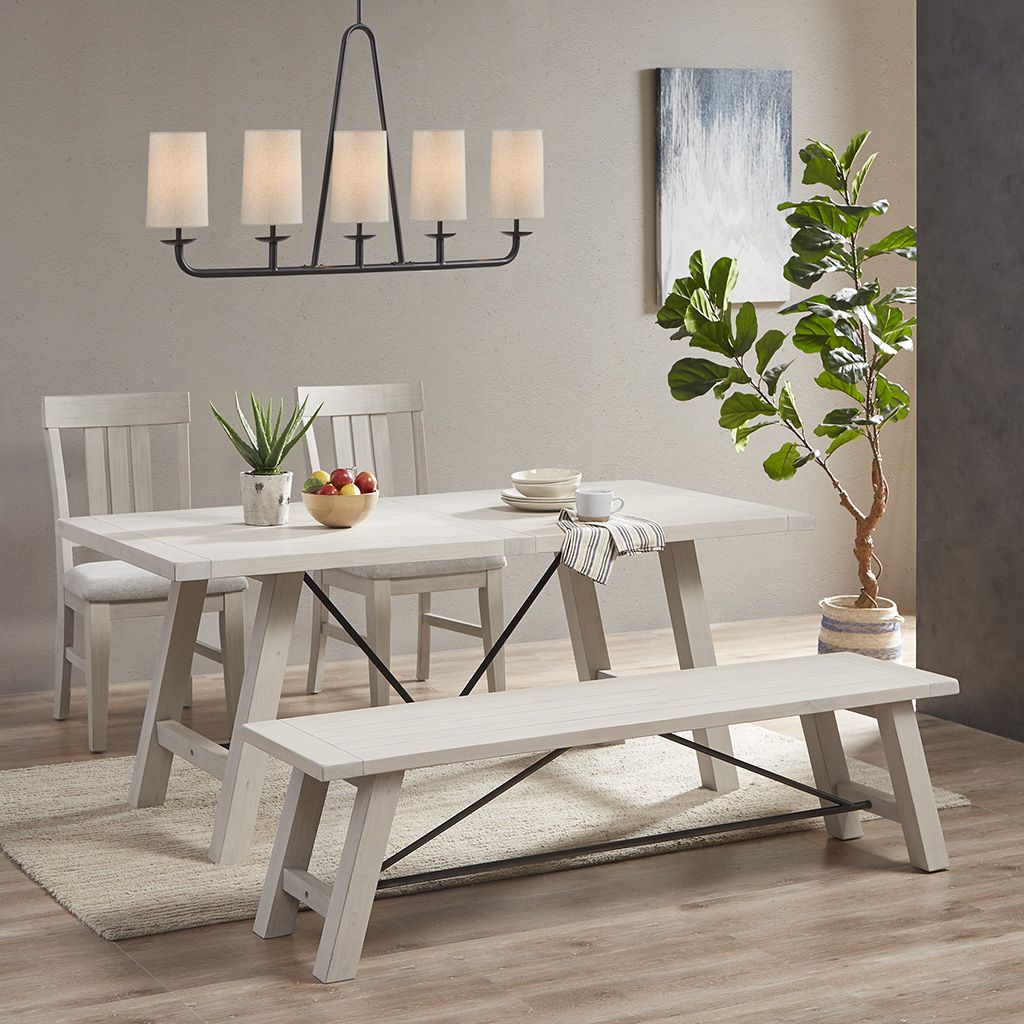 5-light linear chandelier in black metal with cream fabric shades above a dining table