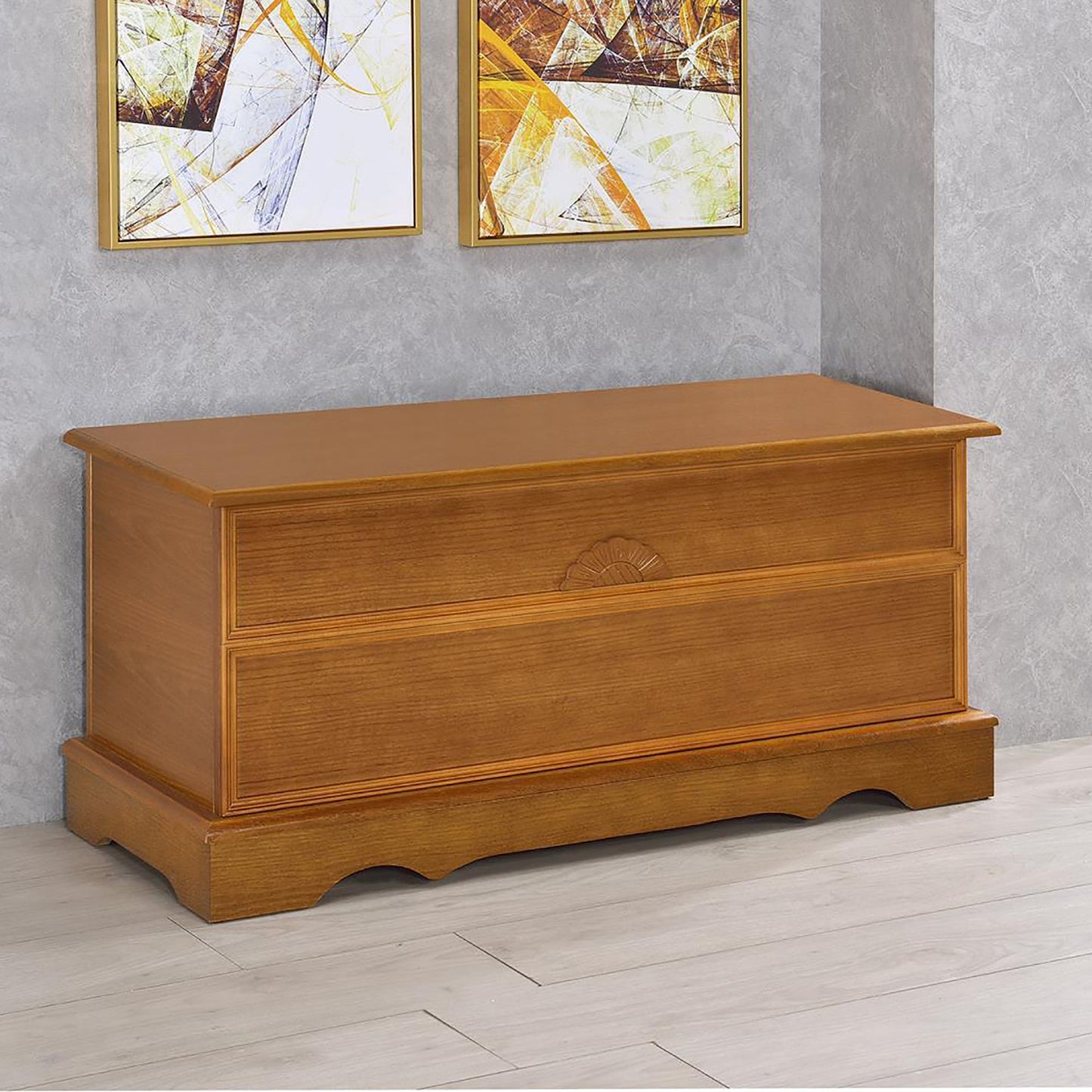Honey Cedar Chest, honey-colored wood storage chest with a carved fan motif on the drawer front.
