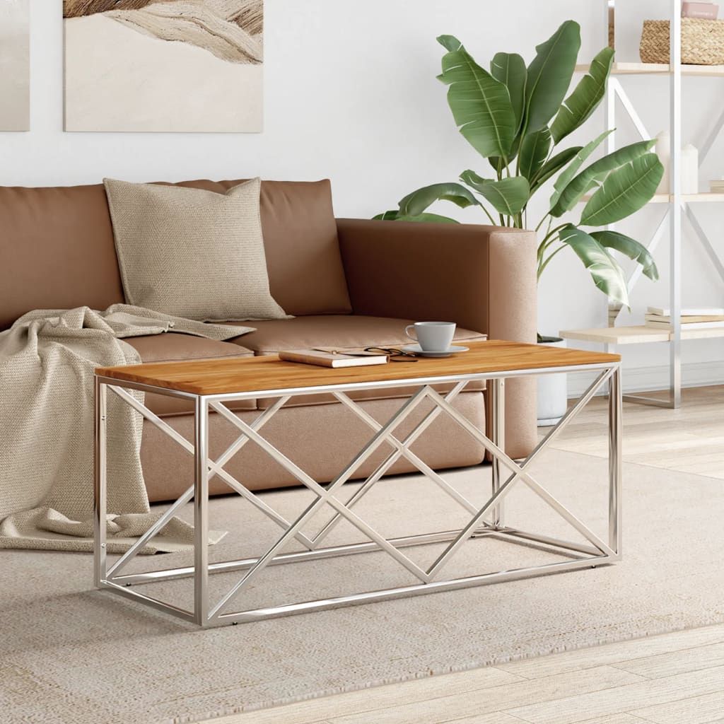 Coffee table with natural acacia wood top and silver metal geometric base by Doba