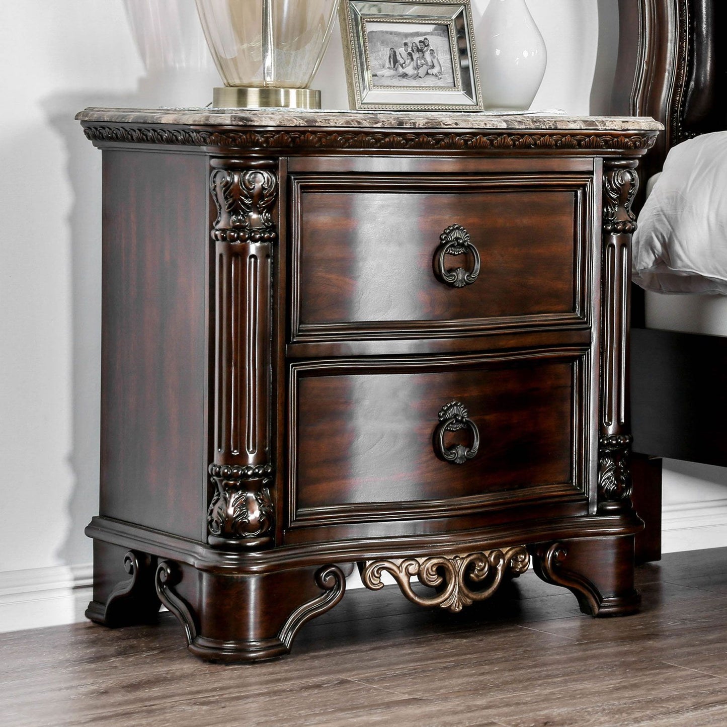 Nightstand in traditional dark brown cherry wood with marble top, two drawers and brass ring pulls
