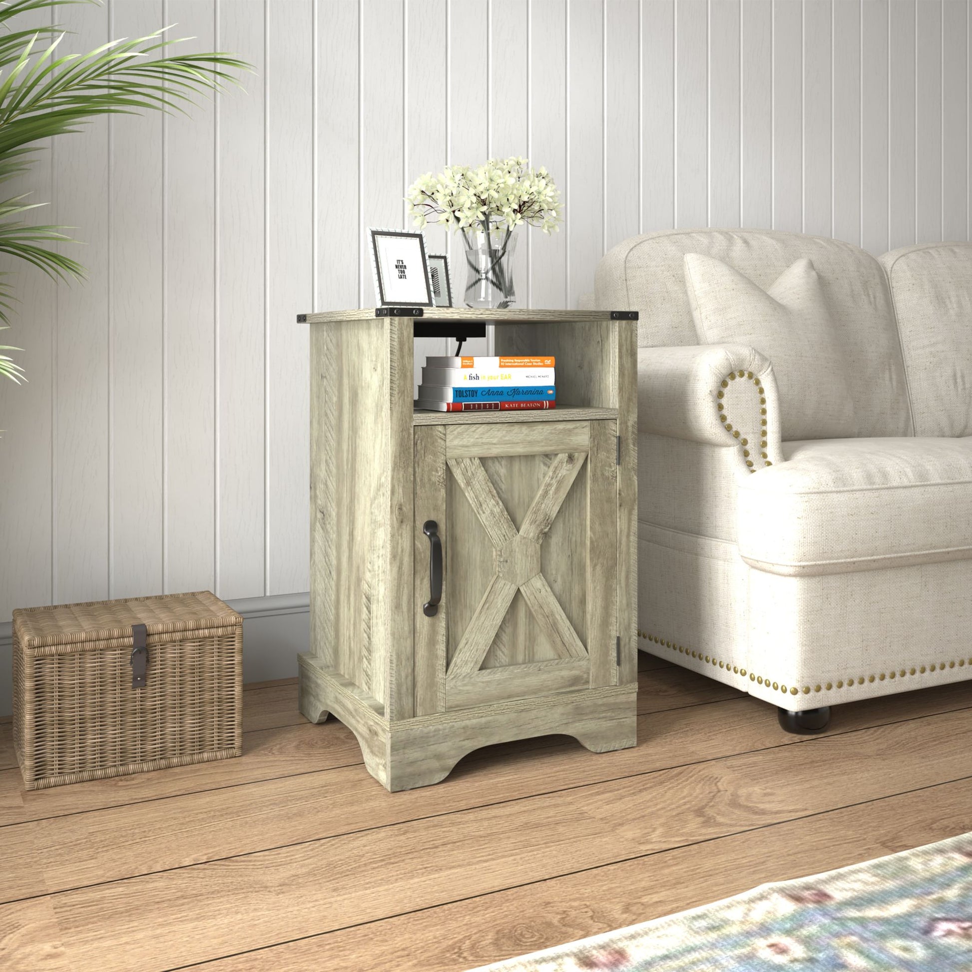 Farmhouse wooden nightstand with light grey finish and X-panel design beside beige sofa