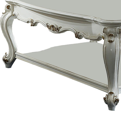Traditional Style Wooden Coffee Table with Polyresin Carvings and Bottom Shelf, White - View 4