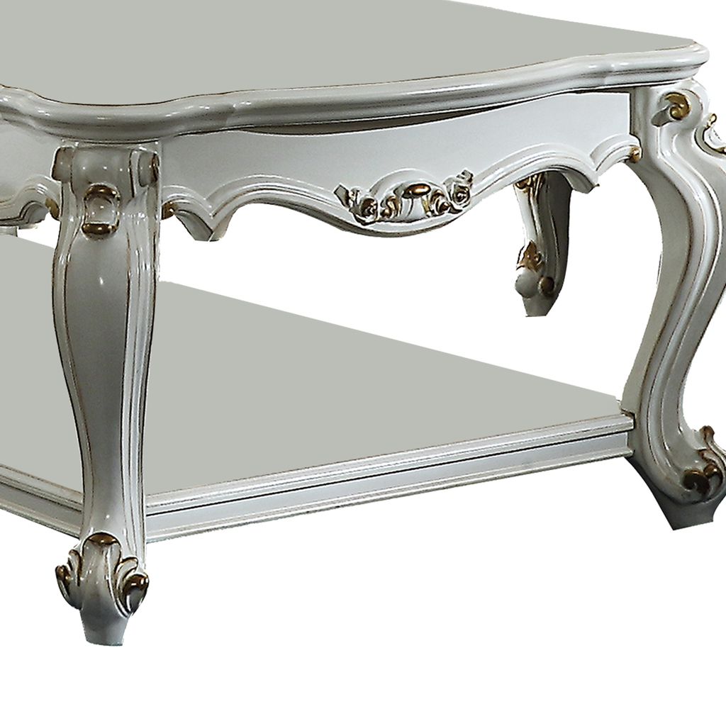 Traditional Style Wooden Coffee Table with Polyresin Carvings and Bottom Shelf, White - View 3