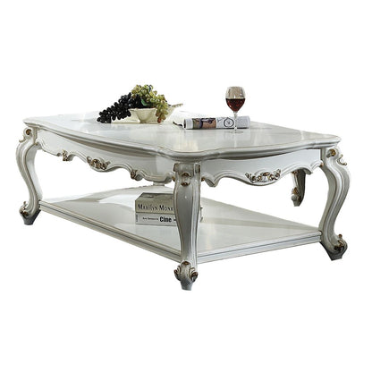 Traditional Style Wooden Coffee Table with Polyresin Carvings and Bottom Shelf, White